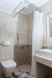 Photo #4 of Ammos Beach Seaside Luxury Suites Hotel in Olimpiaki Akti, Greece