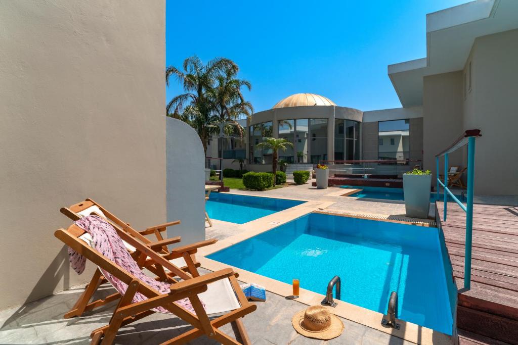 Photo of All Senses Ocean Blue Sea Side Resort - All Inclusive in Kremasti, Greece