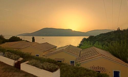 Photo #2 of KAMINAKIA Apartments - Adults only policy - Delve into this little oasis where peace and quiet reign supreme - Sheltered by an evergreen cypress forest - Offering a large swimming pool exclusively for guests' use and breathtaking sea views from every room in Fiskardo, Greece