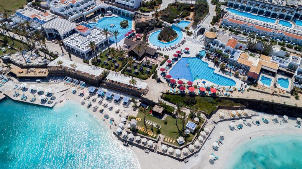 Photo #1 of Minos Imperial Luxury Beach Resort & Spa Milatos in Paralia Milatou, Greece