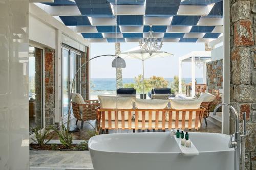 Photo #3 of Minos Imperial Luxury Beach Resort & Spa Milatos in Paralia Milatou, Greece