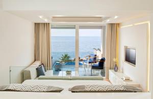 Photo #6 of Minos Imperial Luxury Beach Resort & Spa Milatos in Paralia Milatou, Greece
