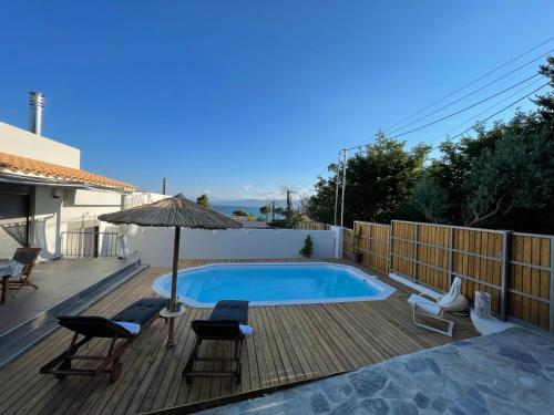 Photo #3 of Μοντέρνα εξοχική μονοκατοικία με ιδιωτική πισίνα! in Chalkoutsi, Greece