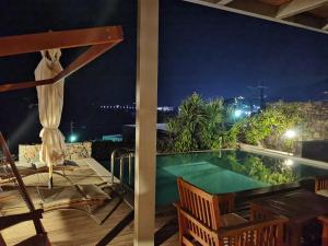 Photo #4 of Andromeda Sea View Villa in Mavrikiano, Greece