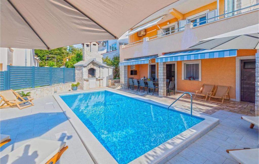 Photo #1 of Vacation house with heated swimming pool 70 meters from the beach-Bobanac in Ražanj, Croatia