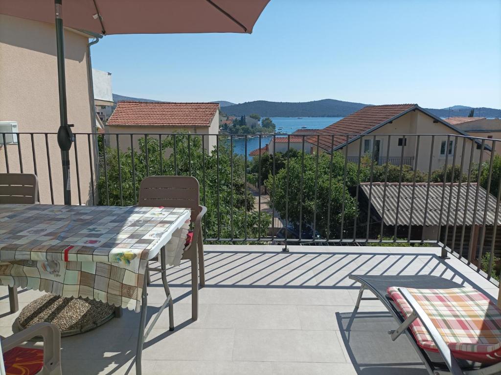 Photo of Spacious 2-bedroom apartment with terrace sea view in Žaborić, Croatia