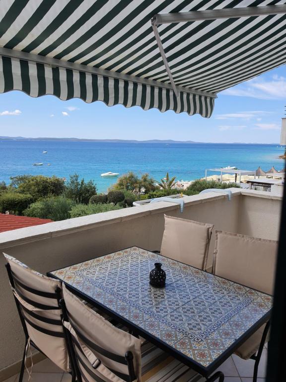 Photo of Apartments with sea view in Kožino, Croatia