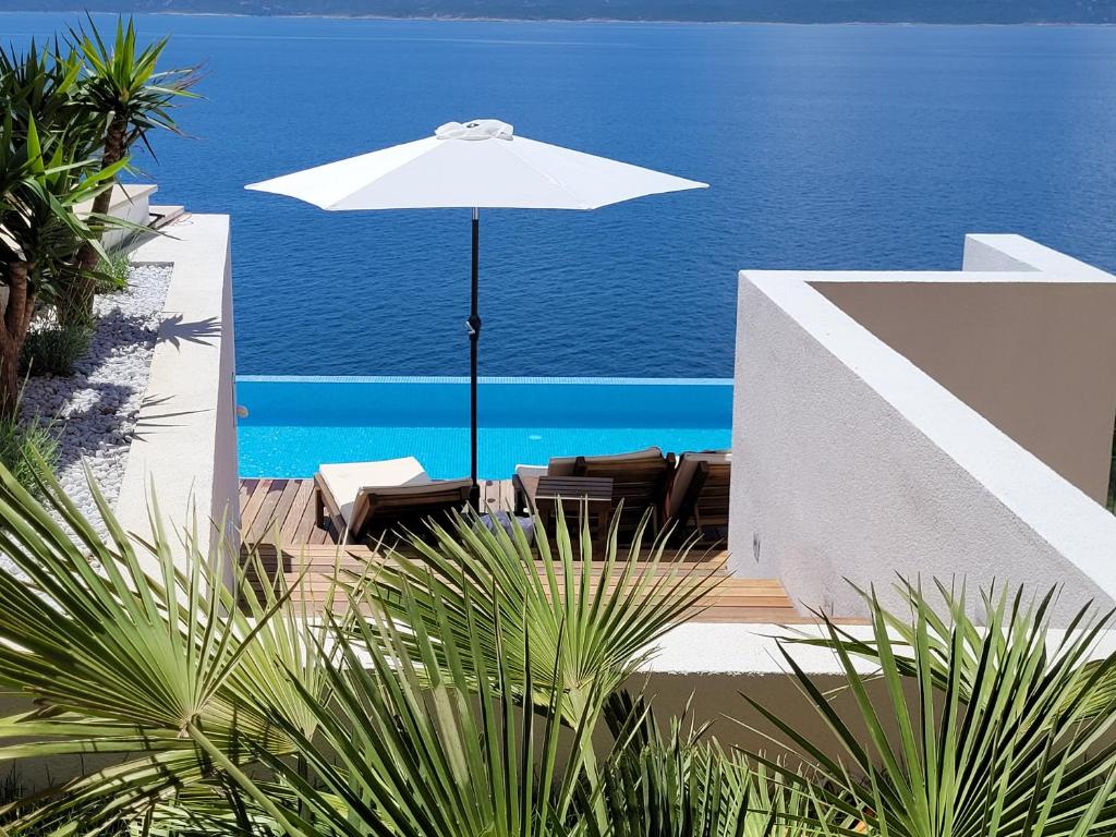 Photo #1 of Luxury Apartments Villa Ruzmarina with New heated Infinity Pool and Lounge Area in Marušići, Croatia