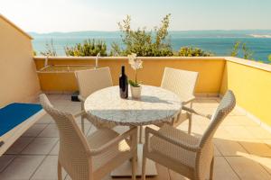 Photo #5 of Luxury Apartments Villa Ruzmarina with New heated Infinity Pool and Lounge Area in Marušići, Croatia