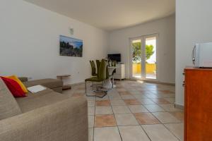 Photo #6 of Luxury Apartments Villa Ruzmarina with New heated Infinity Pool and Lounge Area in Marušići, Croatia