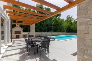 Photo #4 of Beautiful villa Foska with private Pool near the beach in Pavićini, Croatia