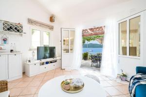 Photo #5 of Apartments Ratac Lobrović with private beach and beautiful sunset in Slano, Croatia