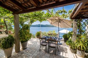 Photo #6 of Apartments Ratac Lobrović with private beach and beautiful sunset in Slano, Croatia