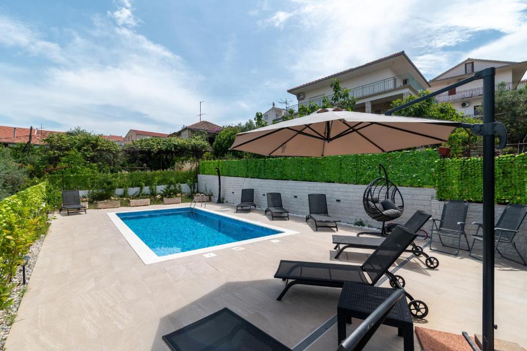 Photo of House Antonija, relax by the sea in Seget Vranjica, Croatia