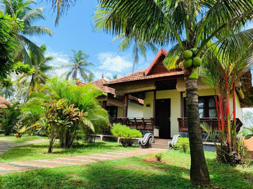 Photo of Maadathil Cottages & Beach Resort in Varkala, India