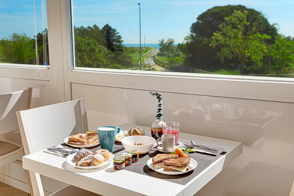 Photo of Hotel-Residence-b&b Le Dune beach service included in Lido Adriano, Italy