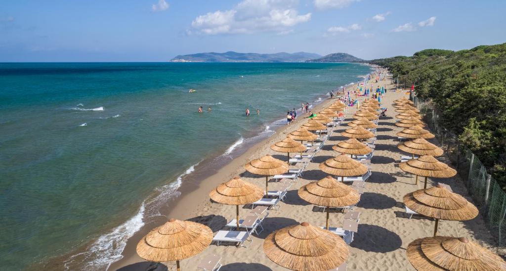 Photo of Camping Village Oasi in Orbetello, Italy