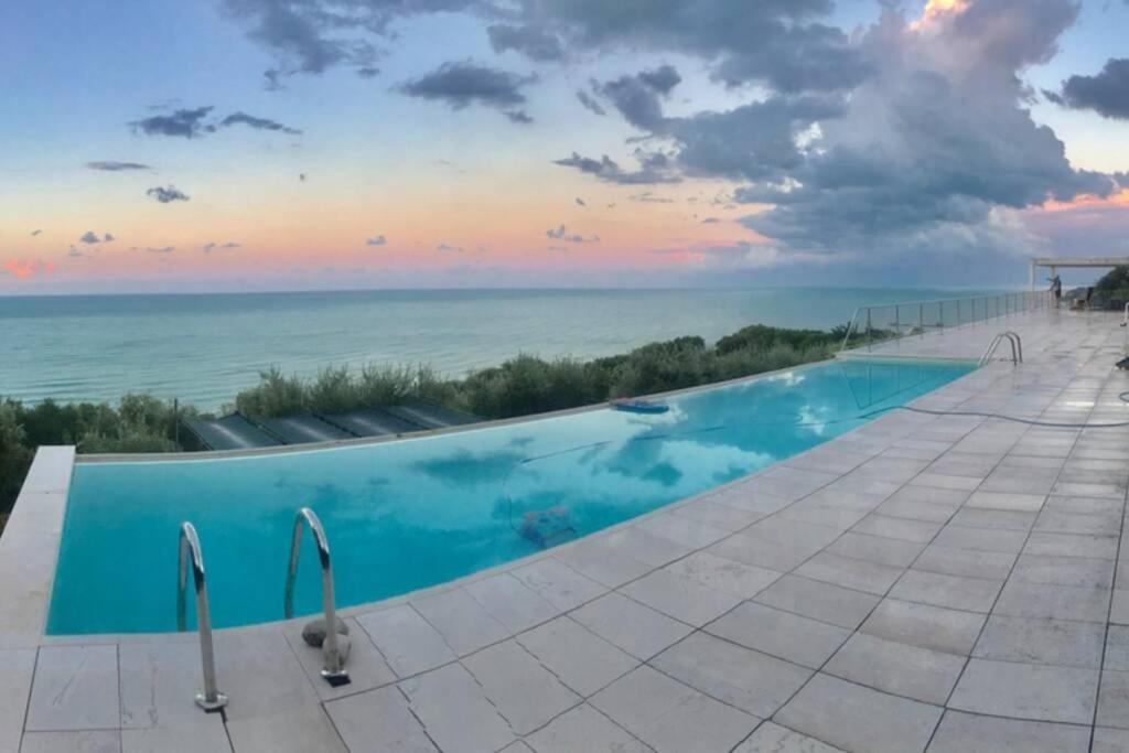 Photo #1 of Stunning Design Villa with unique 180º sea views in Marina di San Vito, Italy