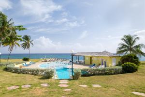 Photo #4 of Jamaica Time Driftwood at Sea Palms 3BR 3BA Condo in Ocho Rios with Pool and Beach Front with Views ONLY 10 Mins from Ochi Intl Airport Direct flight from Miami in Tower Isle, Jamaica