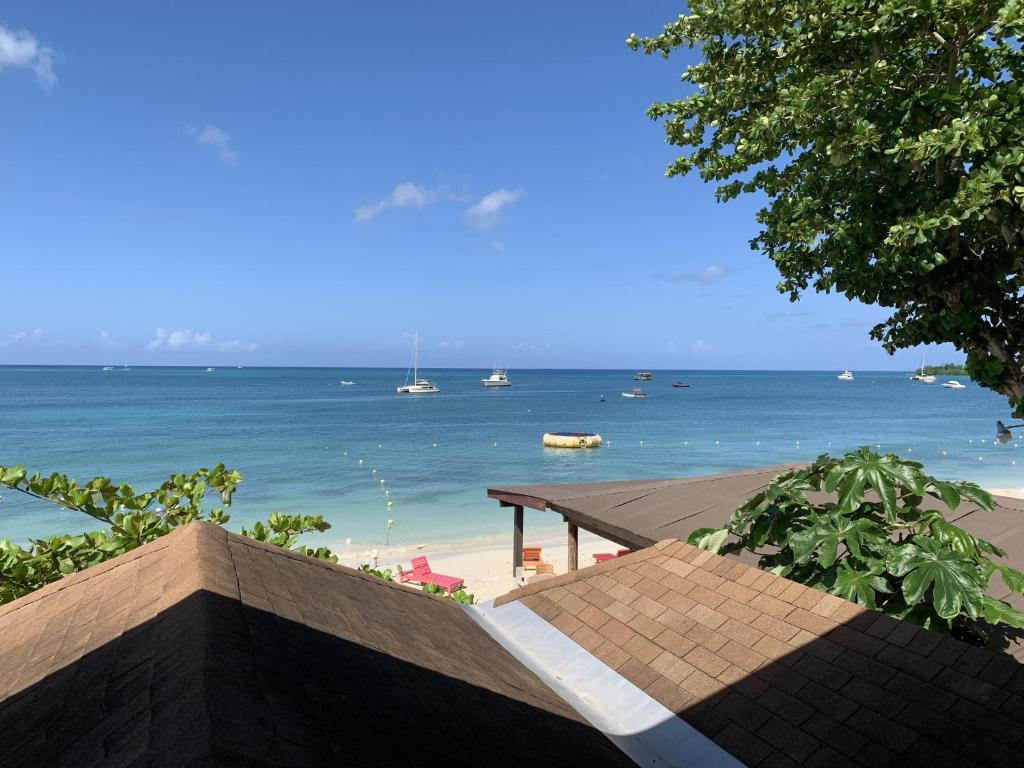 Photo #1 of King Suite at Oceanview Resort in Jamaica - Enjoy 7 miles of White Sand Beach! in Negril, Jamaica