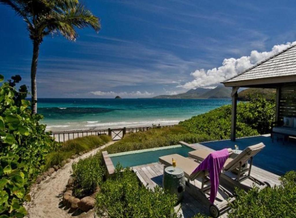 Photo of Oceanfront Beach House - RATE SPECIAL- Valentines on BEACH w Club Access Tennis King Bed in Christophe Harbour, Saint Kitts and Nevis