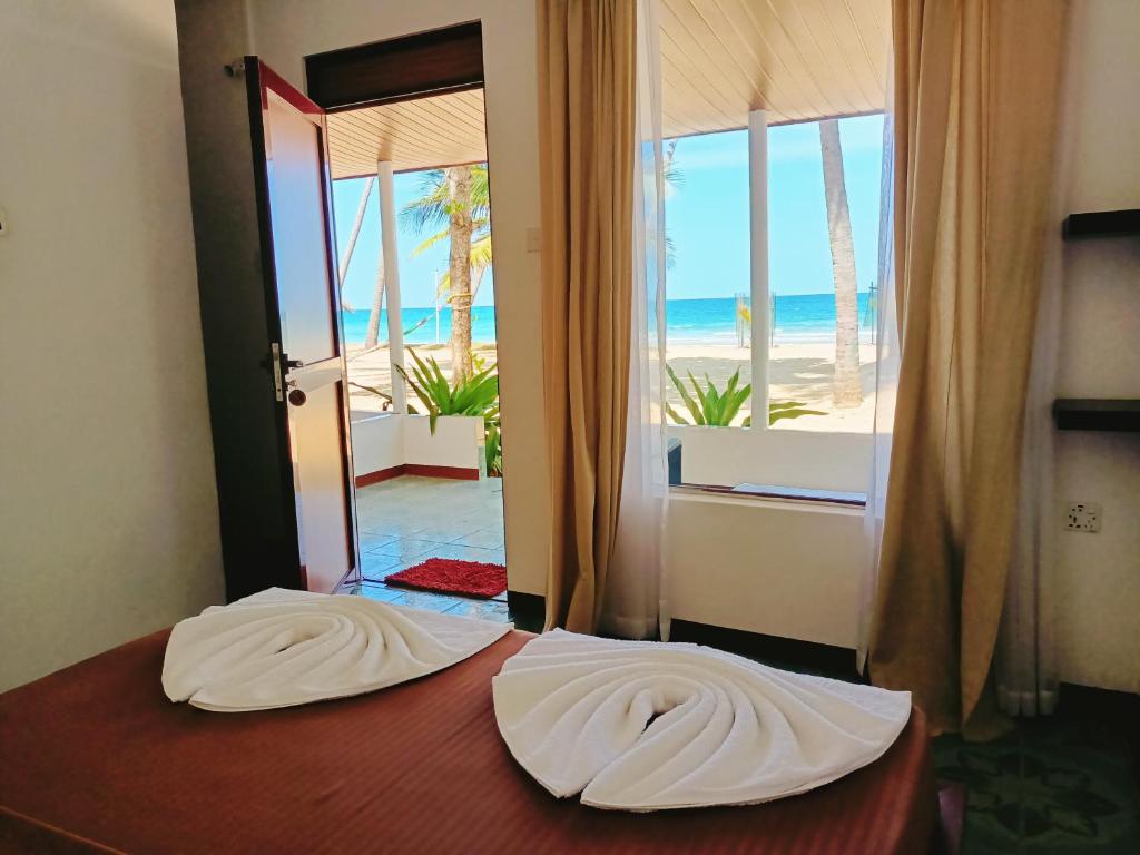 Photo of French garden Pragash Beach Hotel in Trincomalee, Sri Lanka