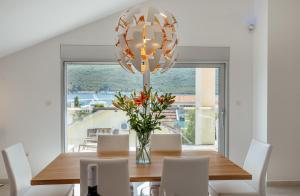 Photo #4 of Apartments Villa Swissmonte in Đenovići, Montenegro