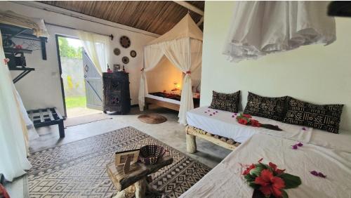 Photo #2 of BORAHA BEACH LODGE lodge de plage avec PISCINE PRIVEE, cuisine, salon, télévision, wifi, coffre, ménage, gardien in Vohilava, Madagascar