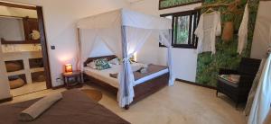 Photo #4 of La VILLA ANKARENA Dans un domaine forestier tropical, villa entière avec PISCINE PRIVEE, Wifi, TV, personnels inclus Plage à 5 minutes à pieds in Vohilava, Madagascar