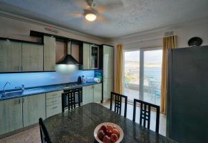Photo #4 of BEACHFRONT with Seaviews Apartment No56 Award Winner Unbeatable Location for Closeness to the Sea Ideal for Guests looking for Winter Spring and Autumn Breaks in Sunny Malta Also Ideal for Coastal Hikers in Marsaskala, Malta