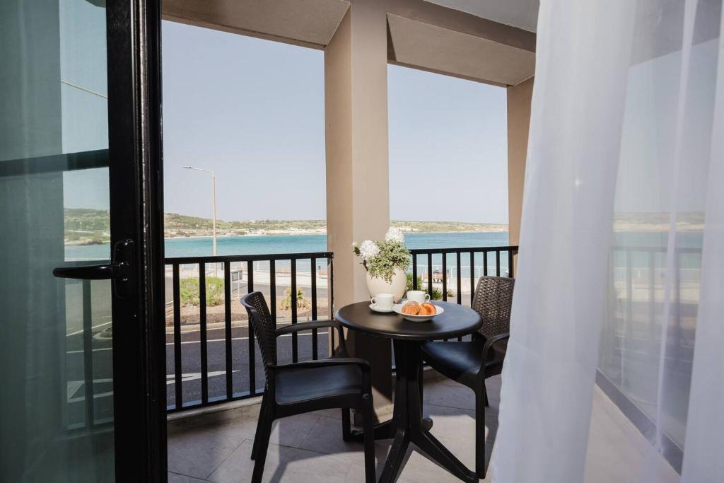 Photo of Seashore Flats Seconds To Sea By Homely Malta! in Mellieħa, Malta