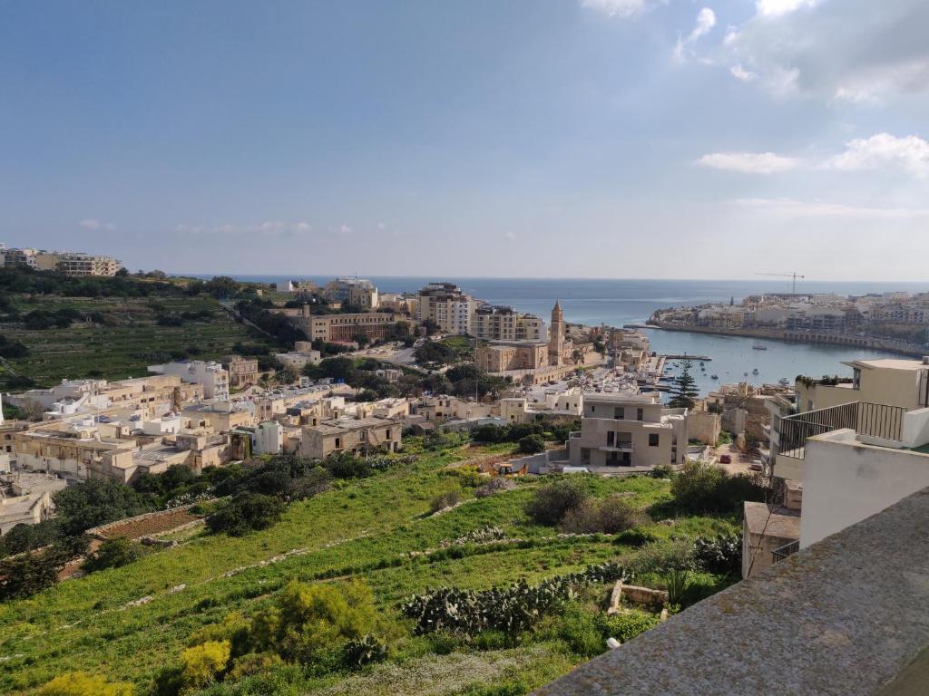 Photo #1 of Panoramic Penthouse in Marsascala which enjoys sea and country views in Wied il Għajn, Malta