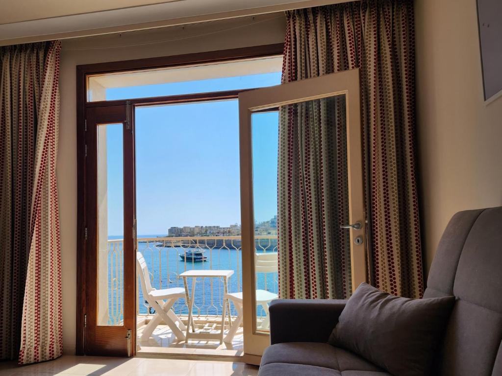 Photo #1 of Seafront Apartment - Wifi - Sleeps 6 - ChrisCourt in Marsaskala, Malta