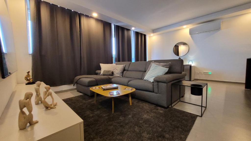 Photo #1 of Stylish - Modern - Large Terrace - 2 Bed - 200 M From Sea - Fully Air Con in San Pawl il Baħar, Malta