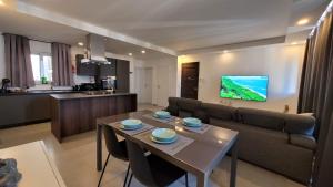 Photo #5 of Stylish - Modern - Large Terrace - 2 Bed - 200 M From Sea - Fully Air Con in San Pawl il Baħar, Malta