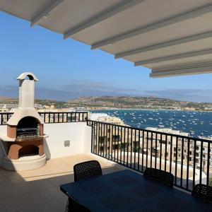 Photo #6 of Penthouse Ghadira With Amazing Views! By Homely in Il Mellieħa, Malta