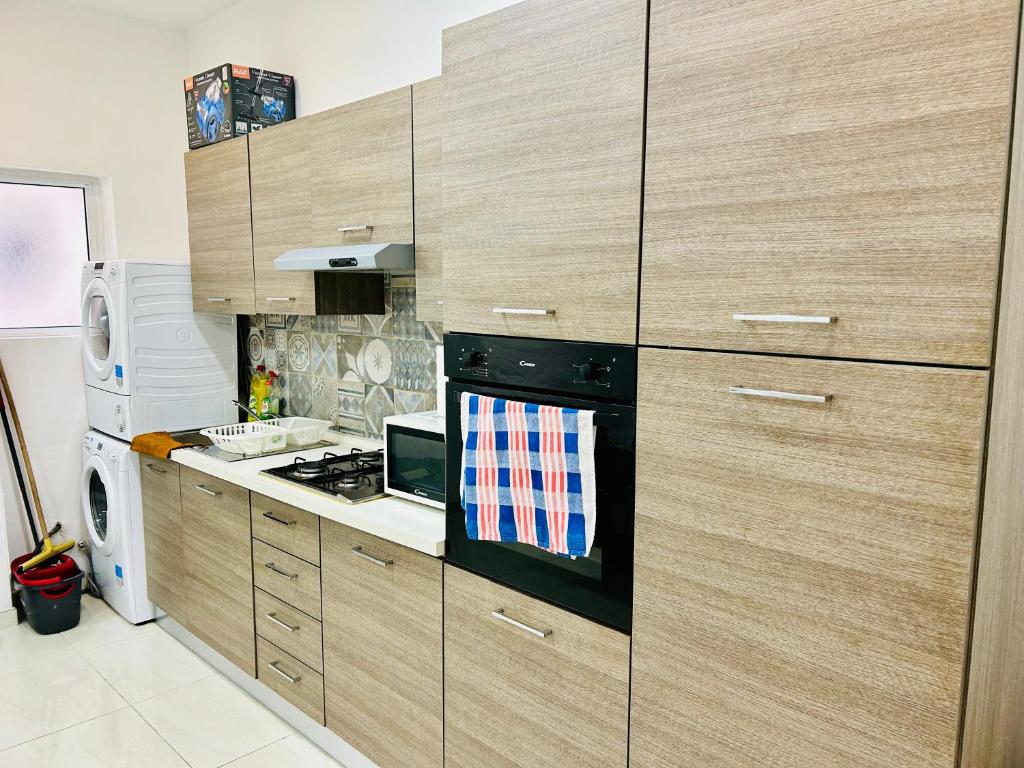 Photo of Steps to the Sea 1-BR Central Apartment in Il Gżira, Malta