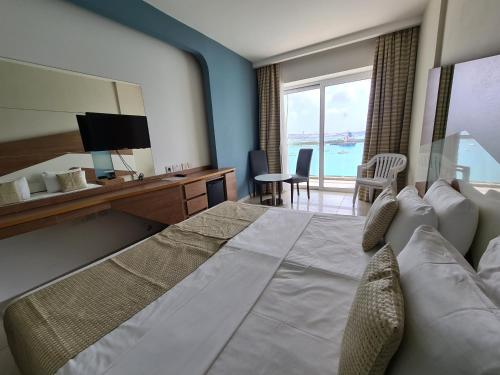 Photo #2 of Water's Edge Hotel in Birżebbuġa, Malta