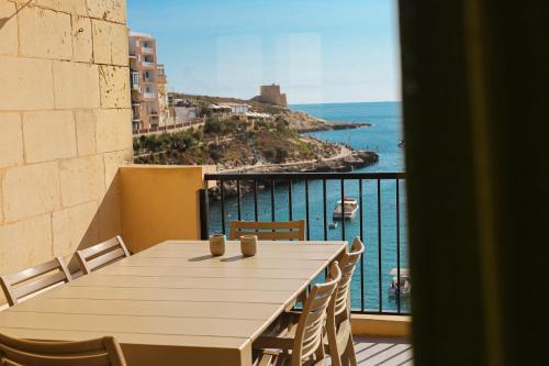 Photo #2 of Seafront duplex Penthouse with Terrace overlooking Xlendi Bay in Gozo, Malta