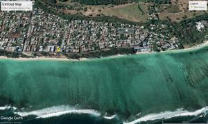 Photo #4 of Blue Waves Beachfront Penthouse in Flic en Flac, Mauritius