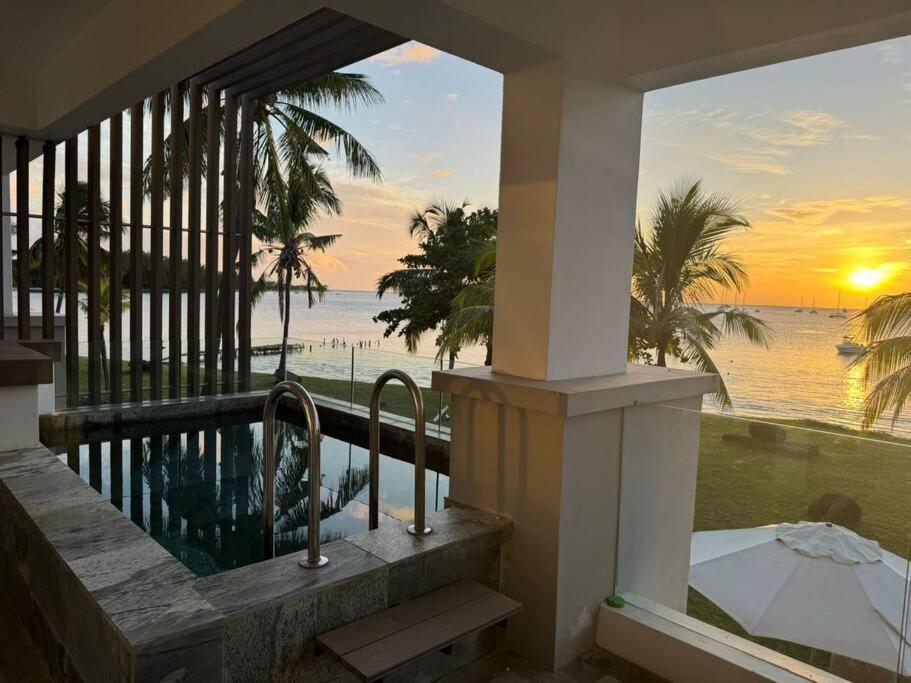 Photo of Luxurious Sunset Beachfront Apt - LMB12 in Black River, Mauritius
