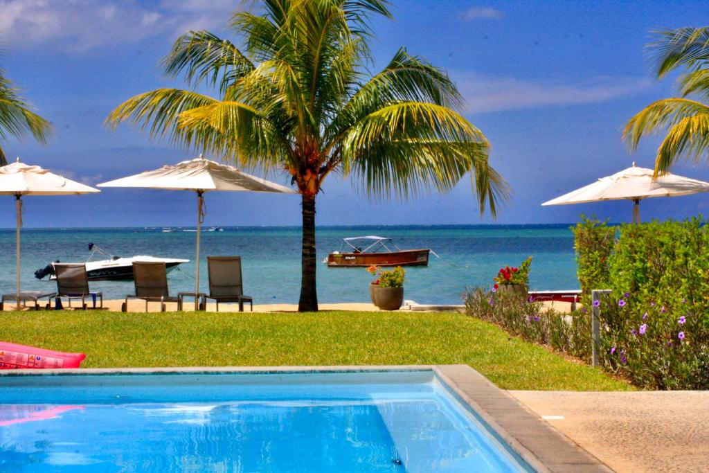 Photo of L'Escale 3 bedrooms Sea View and Beachfront Suite by Dream Escapes in Rivière Noire, Mauritius