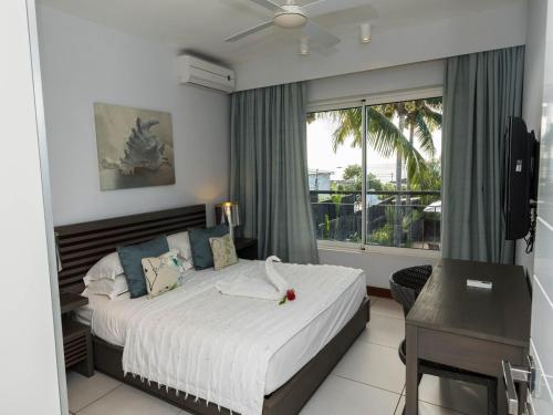 Photo #2 of Beachfront & Pool serviced apartment with stunning view - closest to the beach than most hotel in Trou aux Biches, Mauritius