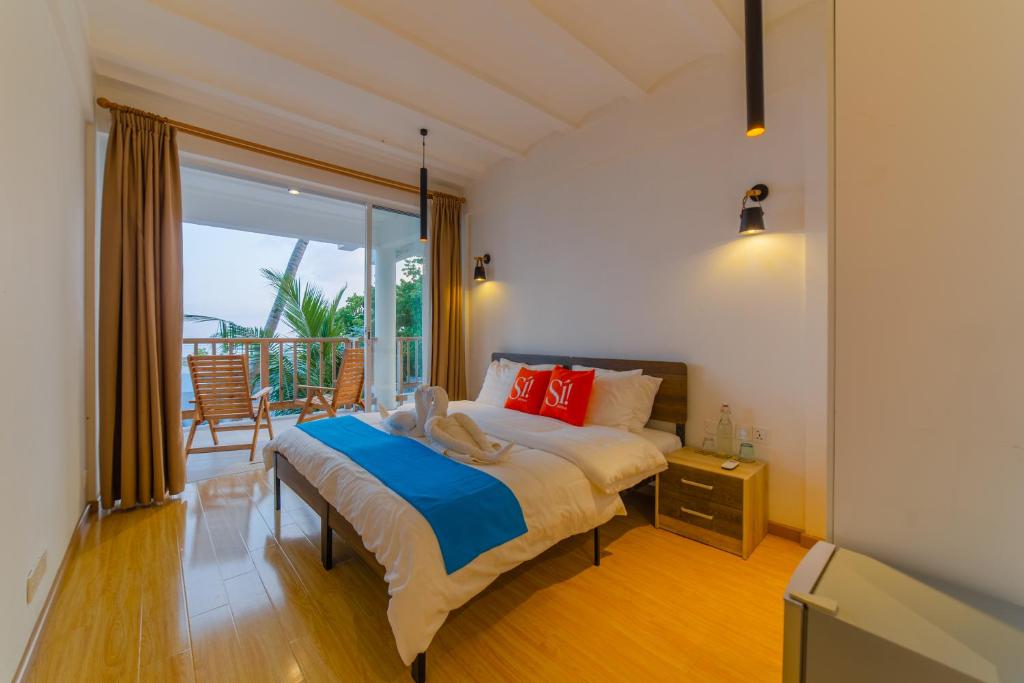 Photo of Si! Coral Inn in Thulusdhoo, Maldives