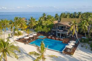 Photo #4 of Outrigger Maldives Maafushivaru Resort in Maafushivaru island, Maldives