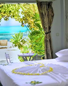 Photo #4 of Crown Beach Villas with direct access to the Bikini Beach in Dhiffushi, Maldives