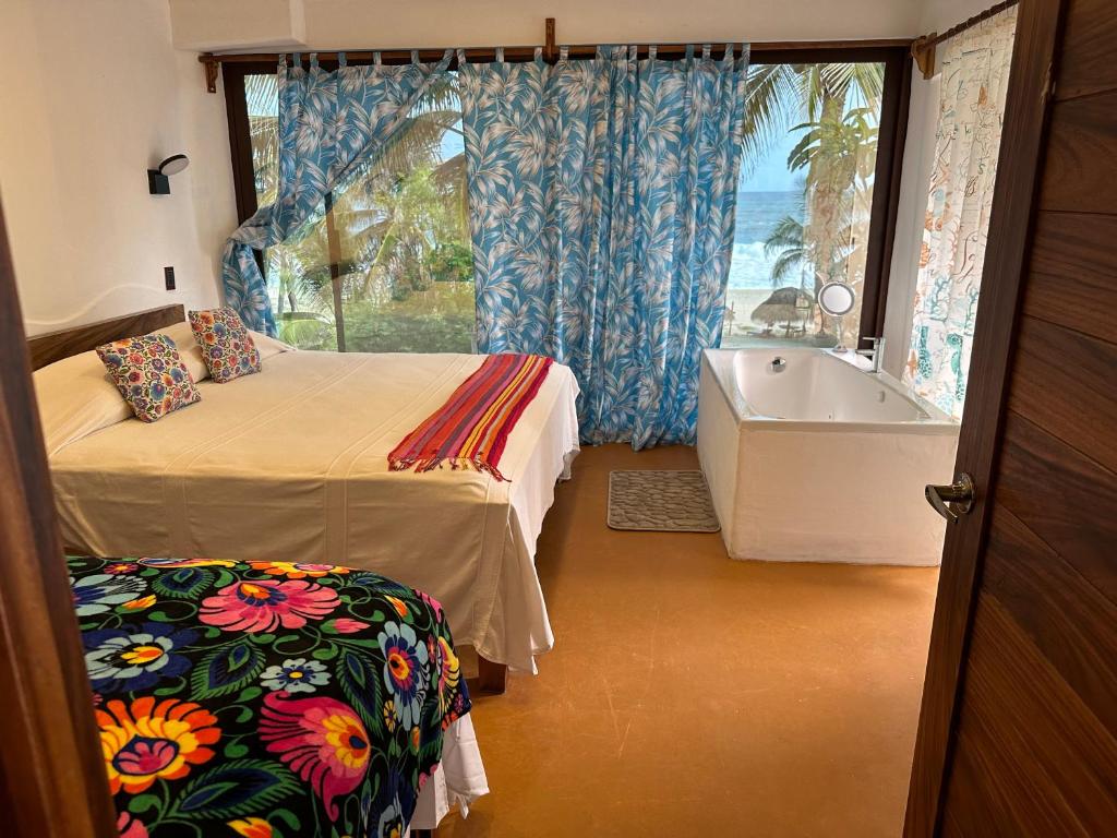 Photo of Beachfront Paradise Boutique Hotel in Agua Blanca, Mexico