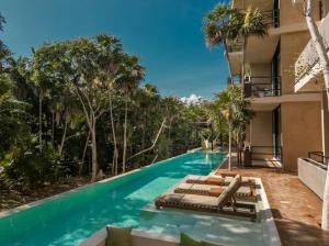 Photo #4 of Luxury and Mordern Beachfront Condo by BT Homes in Balam Canché, Mexico
