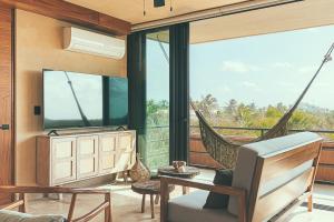Photo #6 of Luxury and Mordern Beachfront Condo by BT Homes in Balam Canché, Mexico