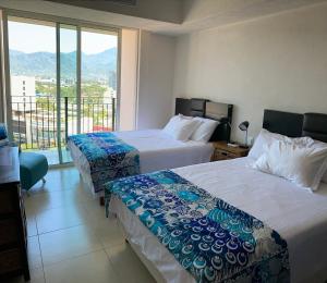 Photo #4 of Ocean front Grand Venetian corner condo in Puerto Vallarta, Mexico